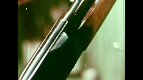 Firearms are proof tested and targeted at a Dupont gun facility in the 1960s. Stock Footage 95599260