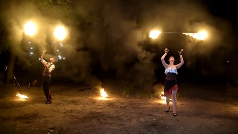 Fireartists doing fireshow at the concert Stock Footage 128971802