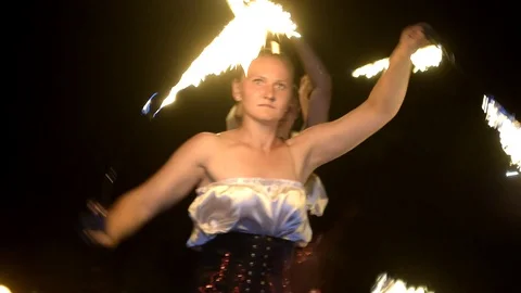 Fireartists doing fireshow at the concert Stock Footage 128971821