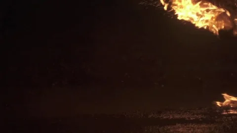 Fireball dropping on the ground with embers flying in slow motion 動画素材 76801035