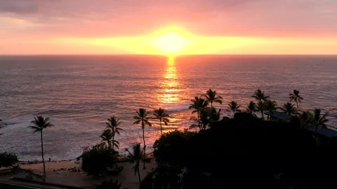 Fireball Sunset Over Pacific Ocean, Vibrant Orange Sky, Big Island Hawaii Stock Footage 328388360
