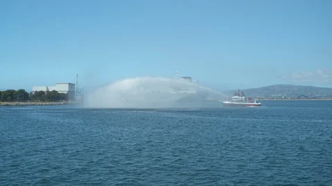 Fireboat doing water gun test on Port of Long Beach Stock Footage 116477284