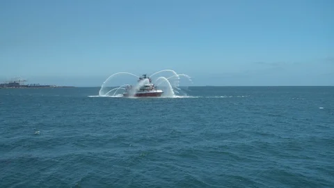 Fireboat doing water gun test on Port of Long Beach Stock Footage 116479565