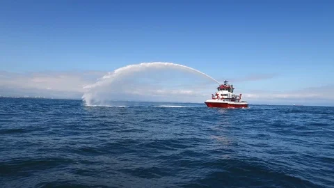 Fireboat Protector doing foam spray tests in the sea Stock Footage 116497037