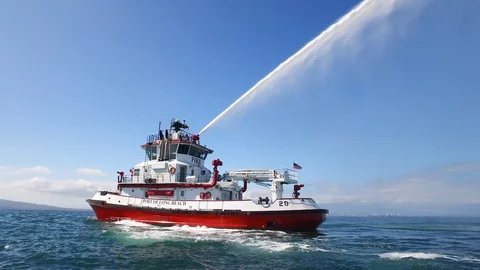 Fireboat Protector doing foam spray tests in the sea Stock Footage 116497299