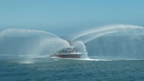 Fireboat Protector doing water gun tests in open water Video stock 116490556