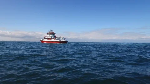 Fireboat Protector doing water gun test in the sea Video stock 116497545