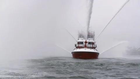 Fireboat protector pumping out water Stock Footage 116474267