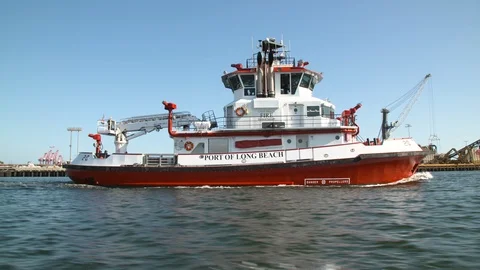 Fireboat Protector sailing through the Port of Long Beach Stock Footage 116470333