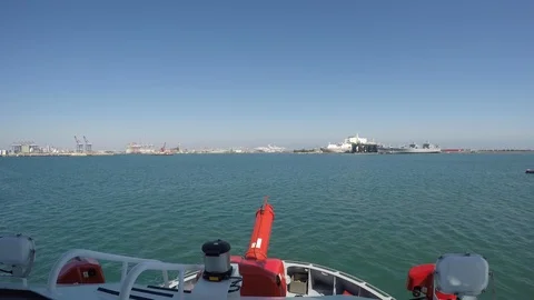 Fireboat Protector shooting out water 
cannon on Port of Long Beach Stock Footage 116509302