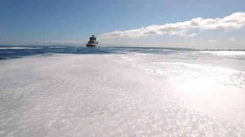 Fireboat Protector testing foam spray at the sea Stock Footage 116498181