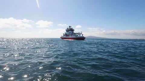 Fireboat Protector testing water guns in the sea Stock Footage 116497750