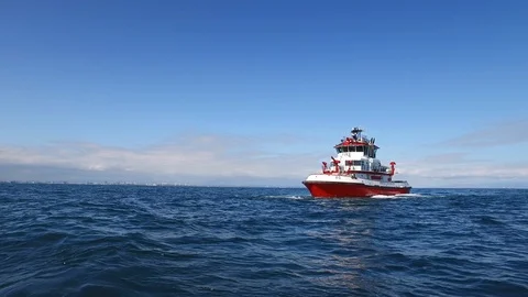 Fireboat Protector testing water guns in the sea Stock Footage 116497885