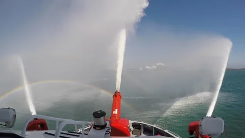 Fireboat Protector with water jets at full power
 on Port of Long Beach Stock Footage 116509569