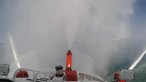 Fireboat Protector with water jets at full power
 on Port of Long Beach Stock Footage 116509734
