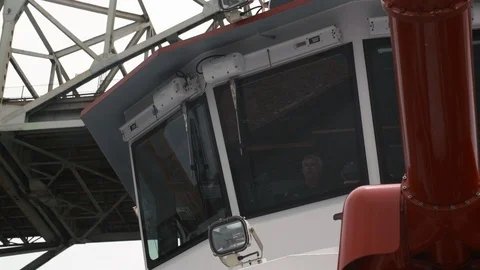 Fireboat sailing under the bridge Stock Footage 116473330