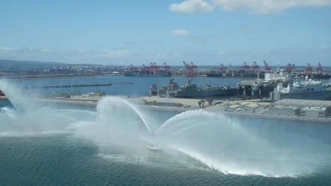 Fireboats Protector and Vigilance doing coordinated water gun test operations Stock Footage 116476321