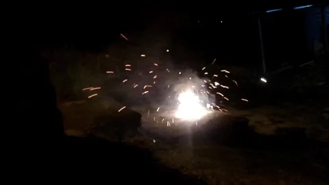 Firecracker explosion at night Stock Footage 331569499