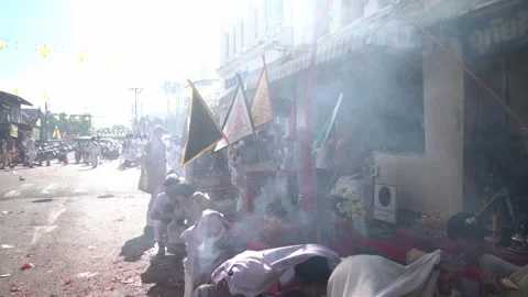 Firecracker explosions during the Phuket vegetarian festival. Stock Footage 261960627