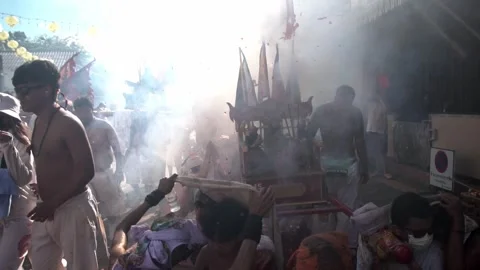 Firecracker explosions during the Phuket vegetarian festival. Video stock 261961713