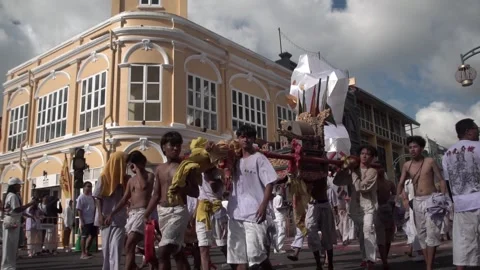 Firecracker explosions during the Phuket vegetarian festival. Stock Footage 261962526
