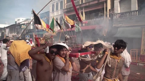 Firecracker explosions during the Phuket vegetarian festival. Vídeos de archivo 261990239