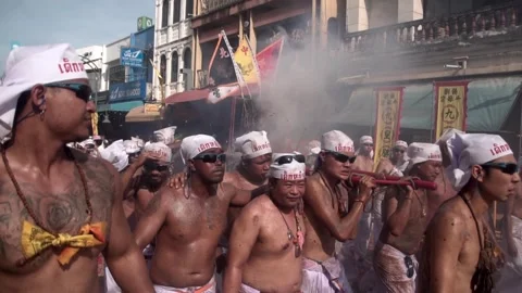 Firecracker explosions during the Phuket vegetarian festival. Stock Footage 261990995
