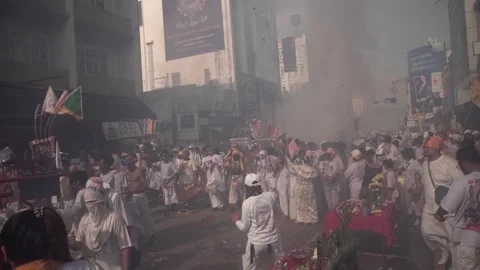 Firecracker explosions during the Phuket vegetarian festival. Stock Footage 262026122