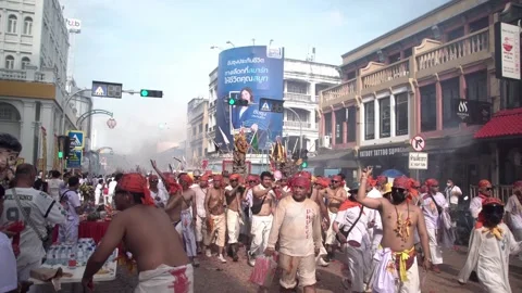Firecracker explosions during the Phuket vegetarian festival. Stock Footage 262026556