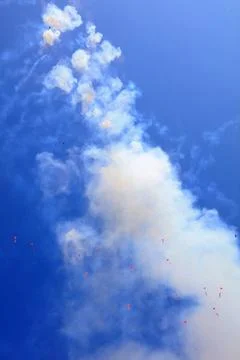 Firecracker smoke in the blue sky Stock Photos