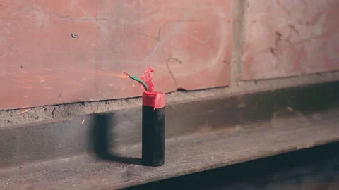 Firecracker Was Lighterd Up and Explode Stock Footage 144851673