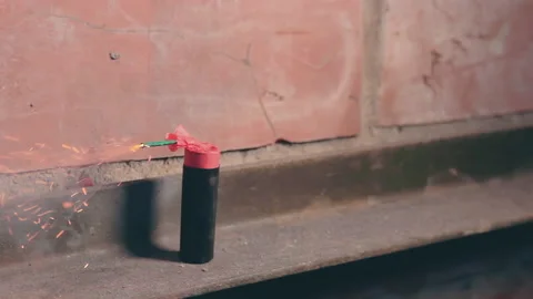 Firecracker Was Lighterd Up and Explode Stock Footage 144851843