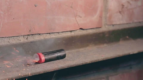 Firecracker Was Lighterd Up and Explode Stock Footage 144852691