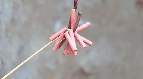 Firecrackers being lit and exploding 스톡 동영상 38281423