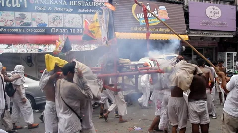 Firecrackers explode over devotees of Chinese Jui Tui Stock-Footage 68957579