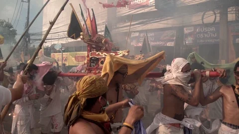 Firecrackers explode over devotees of Chinese shrine. Stock Footage 120366716