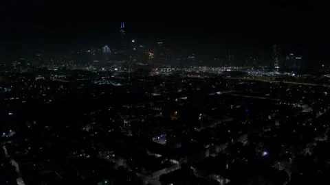 Firecrackers explode while a fan-shaped fireworks cake explodes on a Vídeos de archivo 199065291