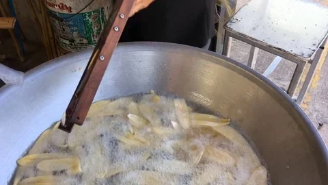 Fired banana in pan 스톡 동영상 76314933