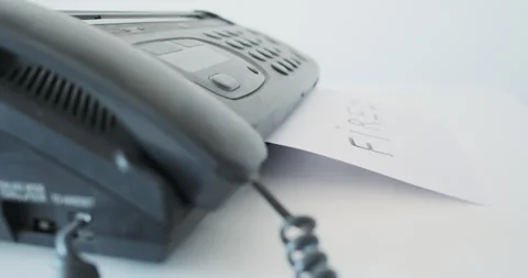 Fired, fax machine prints message on paper, side view. Concept notice of 動画素材 289956074