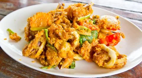 Fired squid with salted egg delicious thai food Stock Photos