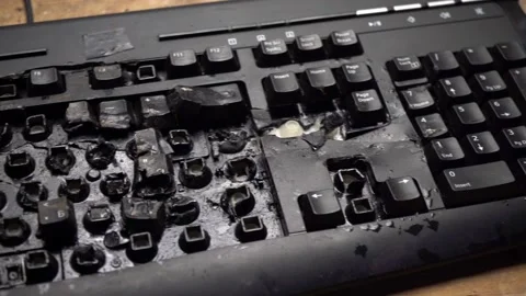 A fired worker smashed a computer keyboard with a hammer. Depression at work. Stock-Footage 136850013