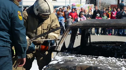Firefighers cutting the with a hydraulic rescue cutter at a extrication 動画素材 62851625