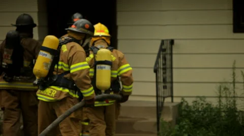 Firefighers Enter House 2 Stock Footage 46970711