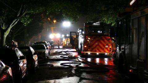 Firefighhters scene in dark street Stock Footage 116711335