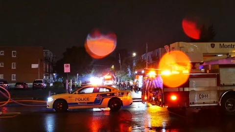 Firefighiters on-scene at rainy night Stock Footage 116711204