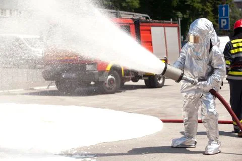 Firefighter in action Stock Photos