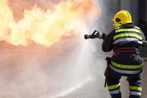 Firefighter in action Stock Photos
