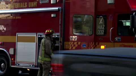 Firefighter arrives at scene Stock Footage 37993174