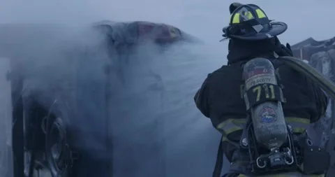 Firefighter Battles Car Fire Auto Accident Rescue Stock Footage 244432590