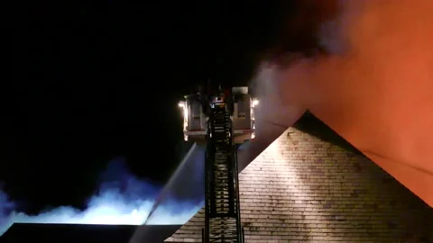 Firefighter with blue lights and orange flames Stock Footage 139657361